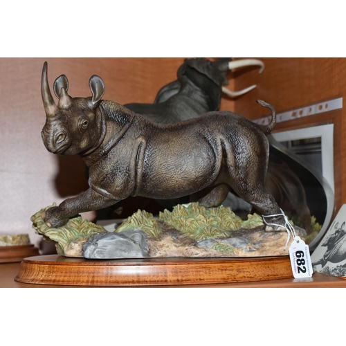 682 - TWO HAND PAINTED PORCELAIN FRANKLIN MINT SCULPTURES, comprising 'African Thunder' an African Black R... 