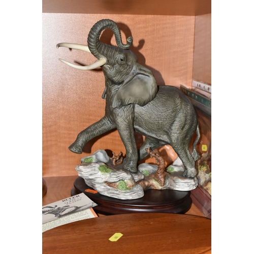 682 - TWO HAND PAINTED PORCELAIN FRANKLIN MINT SCULPTURES, comprising 'African Thunder' an African Black R... 