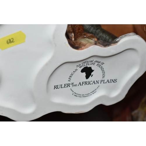 682 - TWO HAND PAINTED PORCELAIN FRANKLIN MINT SCULPTURES, comprising 'African Thunder' an African Black R... 