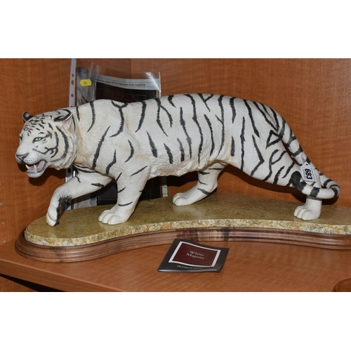 683 - A BOXED FRANKLIN MINT HAND PAINTED PORCELAIN SCULPTURE, 'White Majesty' a depiction of a White Benga... 
