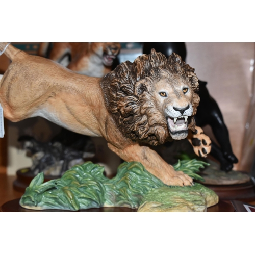684 - THREE FRANKLIN MINT PORCELAIN SCULPTURES OF BIG CATS, comprising 'Pride of the Serengeti' a sculptur... 