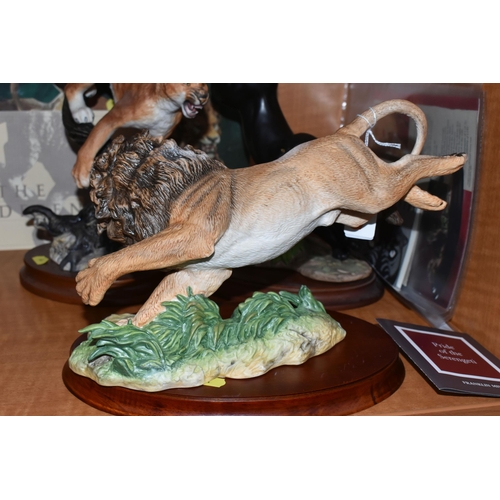 684 - THREE FRANKLIN MINT PORCELAIN SCULPTURES OF BIG CATS, comprising 'Pride of the Serengeti' a sculptur... 