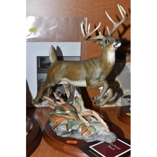 685 - TWO FRANKLIN MINT PORCELAIN AMERICAN ANIMAL SCULPTURES, comprising 'Grizzley' a sculpture of a bear,... 