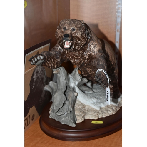 685 - TWO FRANKLIN MINT PORCELAIN AMERICAN ANIMAL SCULPTURES, comprising 'Grizzley' a sculpture of a bear,... 