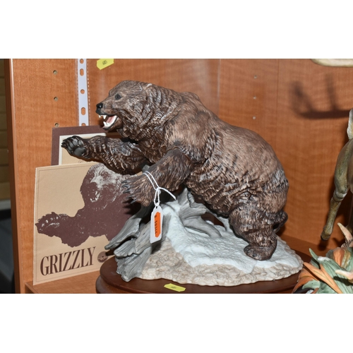 685 - TWO FRANKLIN MINT PORCELAIN AMERICAN ANIMAL SCULPTURES, comprising 'Grizzley' a sculpture of a bear,... 
