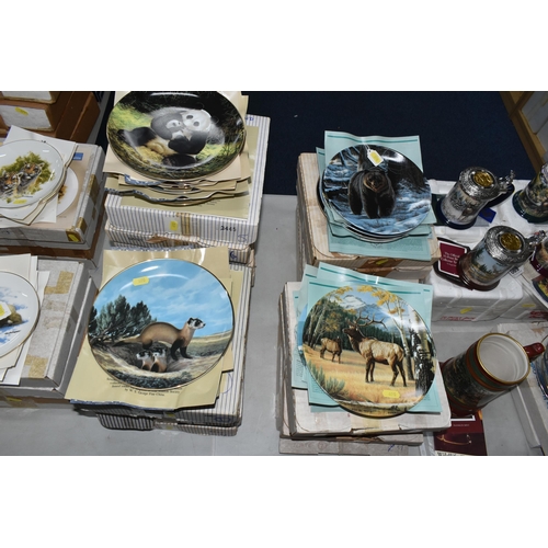 690 - A COLLECTION OF BOXED WILDLIFE THEMED COLLECTORS PLATES AND TANKARDS, to include a set of eight Wedg... 