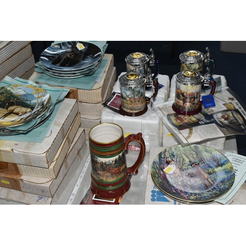 690 - A COLLECTION OF BOXED WILDLIFE THEMED COLLECTORS PLATES AND TANKARDS, to include a set of eight Wedg... 