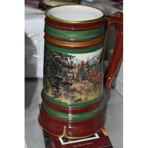 690 - A COLLECTION OF BOXED WILDLIFE THEMED COLLECTORS PLATES AND TANKARDS, to include a set of eight Wedg... 