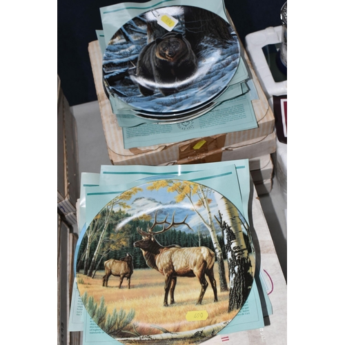 690 - A COLLECTION OF BOXED WILDLIFE THEMED COLLECTORS PLATES AND TANKARDS, to include a set of eight Wedg... 