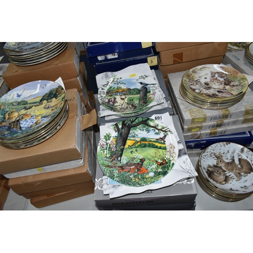 691 - FIFTY FOUR COLLECTORS PLATES, mainly boxed, on the themes of wildlife and pets, series comprising tw... 