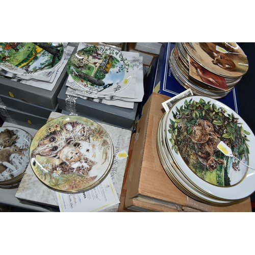 691 - FIFTY FOUR COLLECTORS PLATES, mainly boxed, on the themes of wildlife and pets, series comprising tw... 