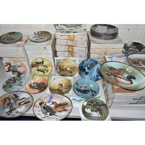 707 - FIVE SETS OF BOXED RIVER AND WILDLIFE THEMED COLLECTOR'S PLATES, comprising four oval plates by the ... 