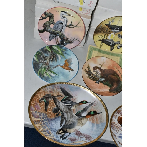 707 - FIVE SETS OF BOXED RIVER AND WILDLIFE THEMED COLLECTOR'S PLATES, comprising four oval plates by the ... 