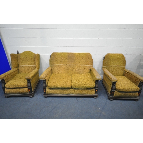 1424 - AN EARLY TO MID 20TH CENTURY OAK THREE PIECE LOUGE SUITE, comprising a two seater settee, length 140... 