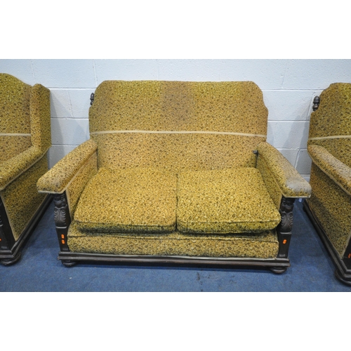 1424 - AN EARLY TO MID 20TH CENTURY OAK THREE PIECE LOUGE SUITE, comprising a two seater settee, length 140... 