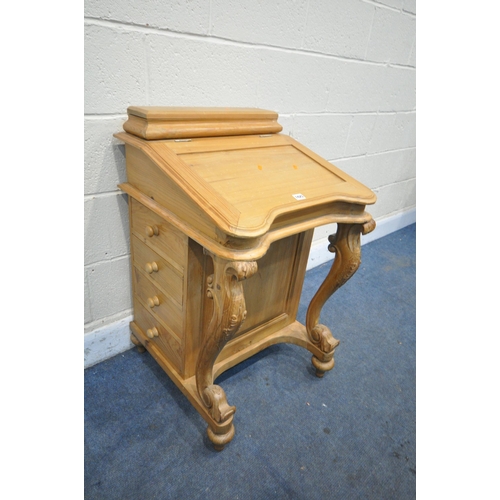 1426 - A VICTORIAN STYLE PINE DAVENPORT, with four drawers to each side, width 56cm x depth 57cm x height 8... 