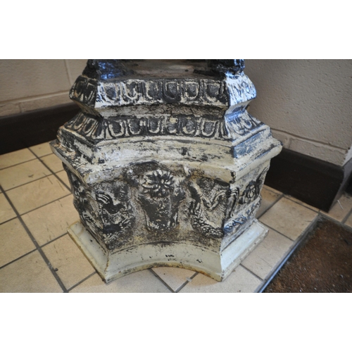 1428 - A CAST IRON CAMPAGNA URN, the urn top supported on four mythical creatures, and base with masks, dia... 