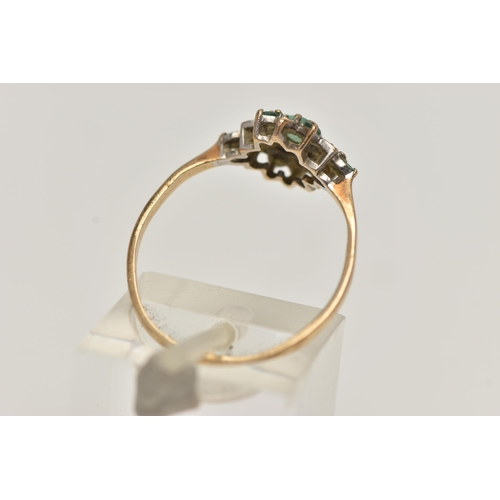 104 - A 9CT GOLD GEM SET CLUSTER RING, circular cut emeralds a and single cut diamonds designed as a flora... 