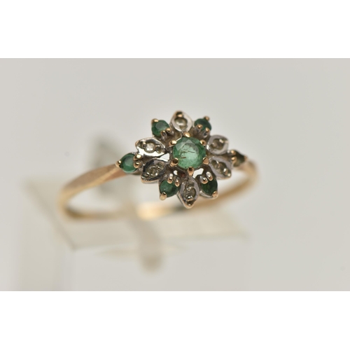 104 - A 9CT GOLD GEM SET CLUSTER RING, circular cut emeralds a and single cut diamonds designed as a flora... 