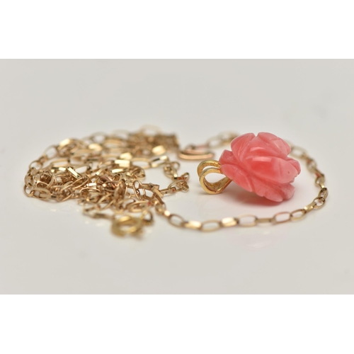 105 - A FLORAL CORAL PENDANT, a carved coral pendant fitted with a gold plated bail, also together with an... 