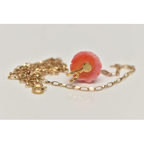 105 - A FLORAL CORAL PENDANT, a carved coral pendant fitted with a gold plated bail, also together with an... 