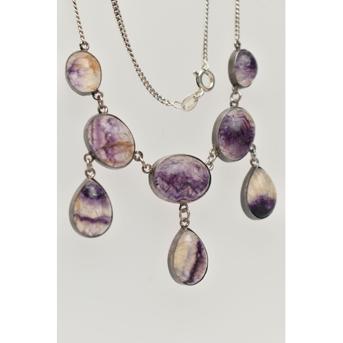 106 - A BLUE JOHN NECKLACE, comprised of five oval cabochon stones and three additional pear cabochon drop... 