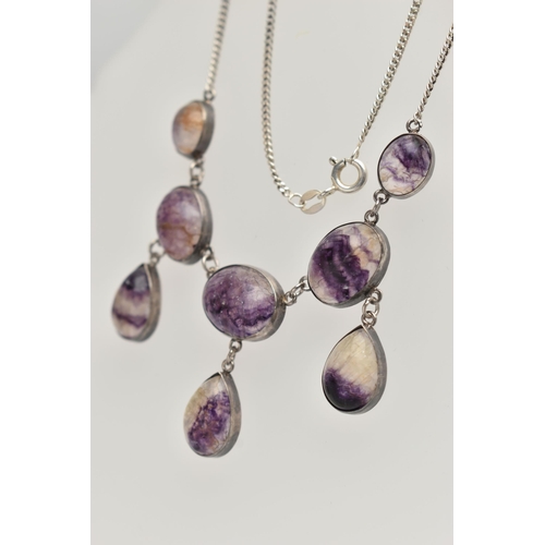 106 - A BLUE JOHN NECKLACE, comprised of five oval cabochon stones and three additional pear cabochon drop... 