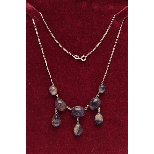 106 - A BLUE JOHN NECKLACE, comprised of five oval cabochon stones and three additional pear cabochon drop... 