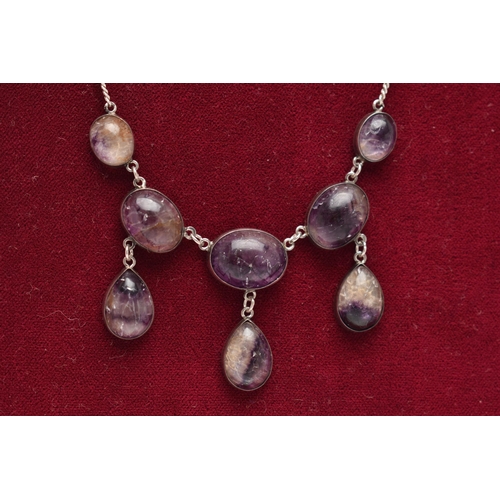 106 - A BLUE JOHN NECKLACE, comprised of five oval cabochon stones and three additional pear cabochon drop... 