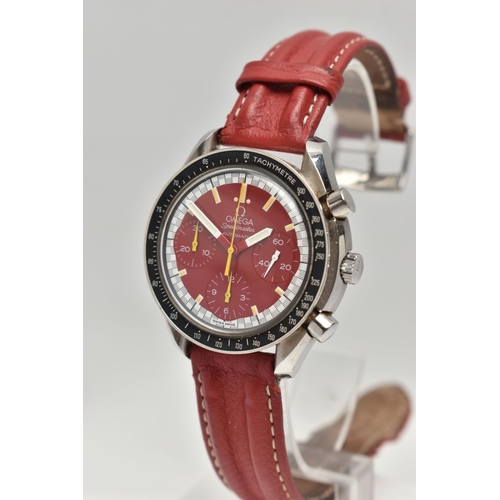 2 - AN OMEGA SPEEDMASTER REDUCED RACING RED MICHAEL SCHUMACHER EDITION WRISTWATCH, red dial with three s... 