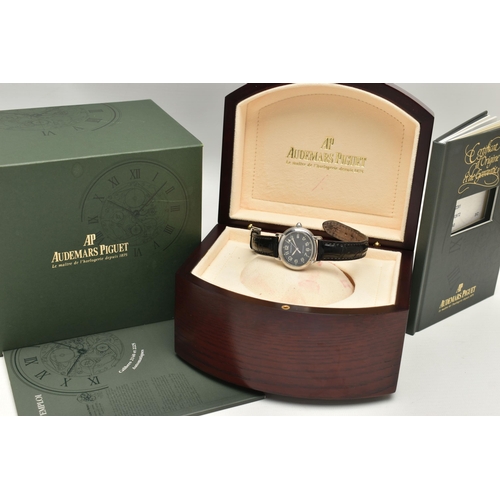 23 - A BOXED STAINLESS STEEL AUDEMARS PIGUET MILLENARY AUTOMATIC WRISTWATCH, black dial with luminescent ... 