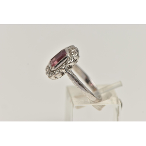 36 - AN 18CT WHITE GOLD, PINK TOURMALINE AND DIAMOND CLUSTER RING, designed with a rectangular cut pink t... 