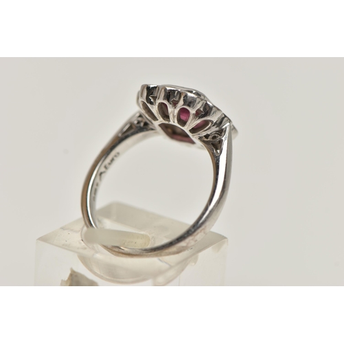 36 - AN 18CT WHITE GOLD, PINK TOURMALINE AND DIAMOND CLUSTER RING, designed with a rectangular cut pink t... 