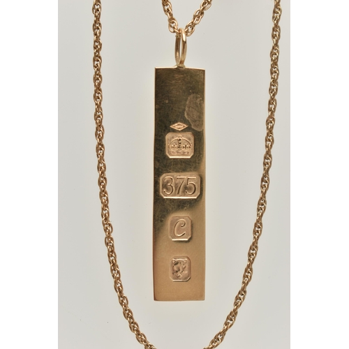 50 - A 9CT GOLD INGOT PENDANT AND CHAIN, rectangular ingot hallmarked 9ct London 1977, fitted with a jump... 