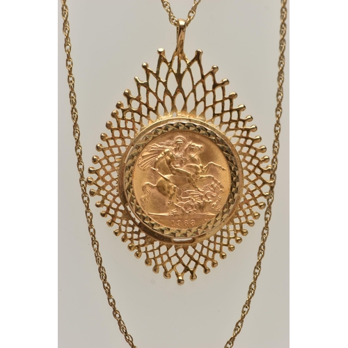 55 - A GOLD FULL SOVEREIGN COIN PENDANT AND CHAIN, sovereign depicting Elizabeth II, dated 1968, within a... 