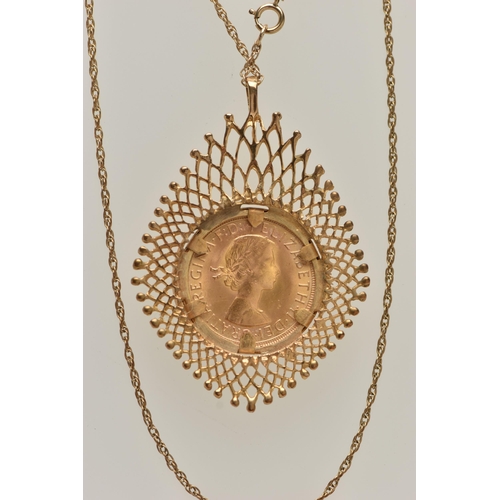 55 - A GOLD FULL SOVEREIGN COIN PENDANT AND CHAIN, sovereign depicting Elizabeth II, dated 1968, within a... 