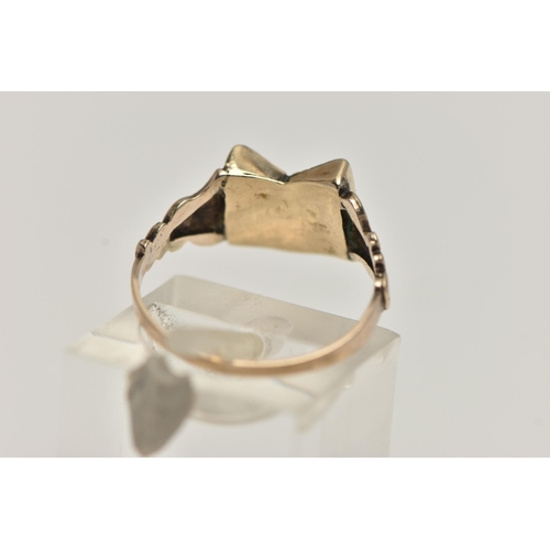 76 - A VICTORIAN MOURNING RING, yellow metal ring in the form of an open book, one side with a vacant gla... 