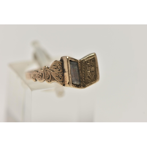 76 - A VICTORIAN MOURNING RING, yellow metal ring in the form of an open book, one side with a vacant gla... 