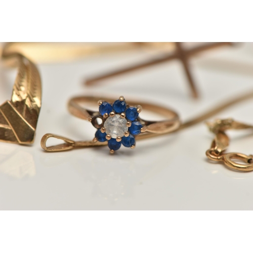 87 - AN ASSORTMENT OF 9CT GOLD JEWELLERY, to include a rose gold cross pendant, two gem set rings and an ... 