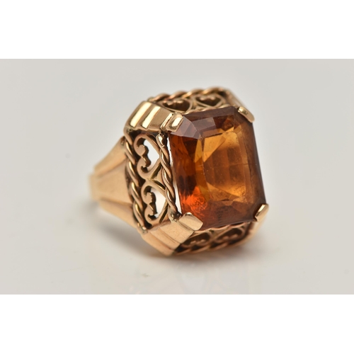 89 - A FRENCH GOLD AND CITRINE RING, rectangular cut deep orange citrine, prong set in yellow gold, a lar... 