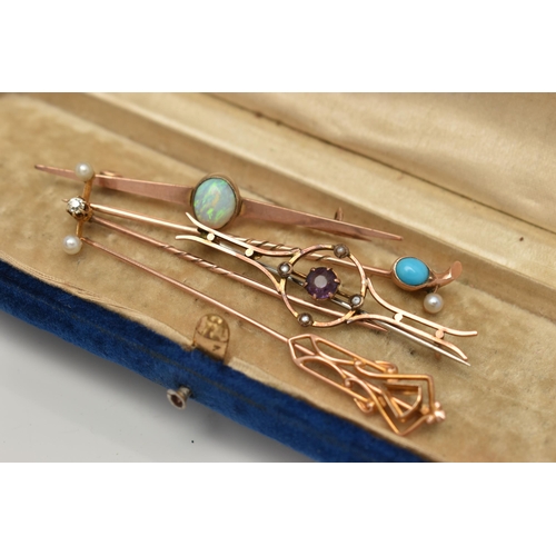 92 - AN ASSORTMENT OF BROOCHES AND STICK PINS, a collection comprising of a diamond and seed pearl stick ... 