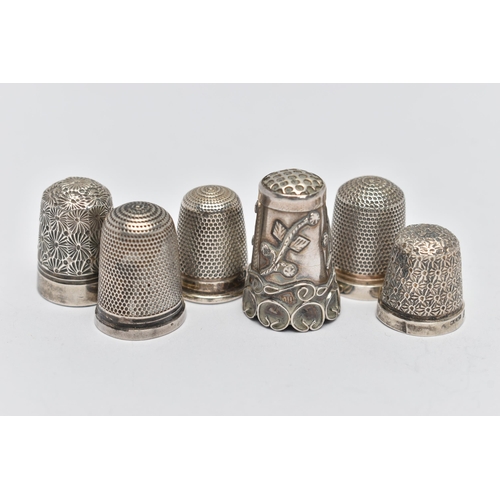 126 - SIX THIMBLES, to include four with full silver hallmarks, approximate gross weight 12.8 grams, one s... 