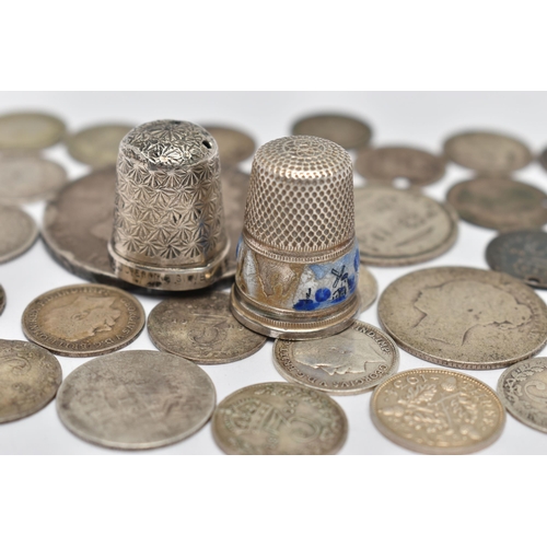 127 - TWO THIMBLES AND COINS, a white metal Delft thimble worn and damaged, a damaged white metal thimble ... 