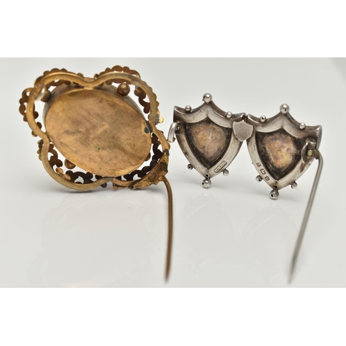 132 - A VICTORIAN MOURNING BROOCH AND A SWEET HEART BROOCH, the yellow metal and black enamel mourning bro... 