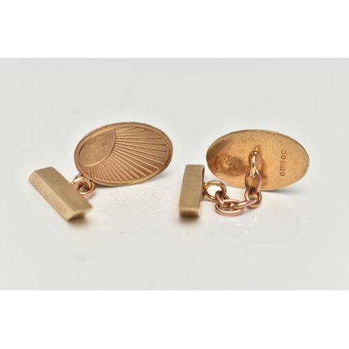 140 - A PAIR OF 9CT GOLD CUFFLINKS, oval cufflinks with engine turned pattern, chain links with rhombus fi... 