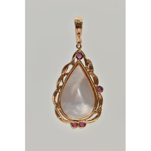 144 - A MABE PEARL AND RUBY PENDANT, a pear Mabe pearl collet set in yellow metal accented with four circu... 