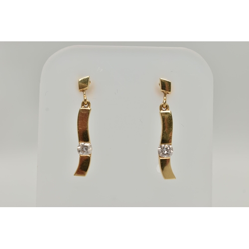 154 - A PAIR OF 18CT GOLD DIAMOND DROP EARRINGS, each of a polished curved bar set with a round brilliant ... 