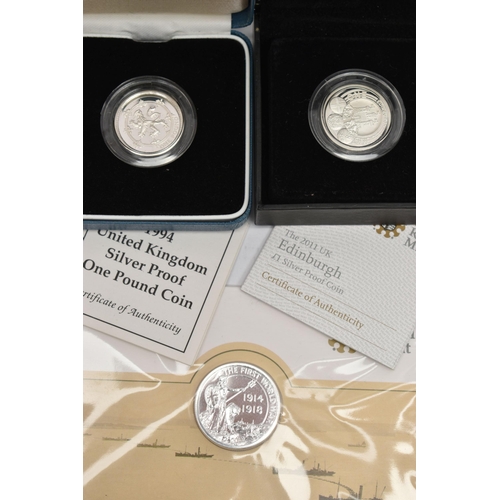 164 - A BAG OF ROYAL MINT BOXED COINS, to include a boxed 'The 2011 UK Edinburgh £1 Silver Proof One Pound... 