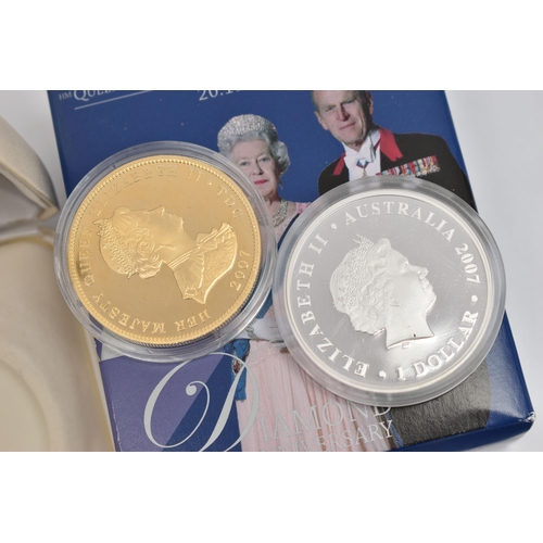 168 - TWO BOXED COINS, to include a gold plated silver Tristan Da Cunha Diana, Princess of Wales Five Poun... 