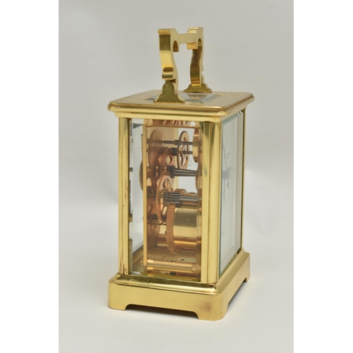 189 - A 'H.SAMUEL' BRASS CARRIAGE CLOCK, key wound, Roman numeral dial, in working order time keeping unte... 